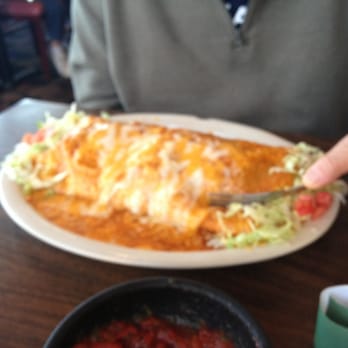 Señor Iguana's - Dennis is enjoying a one-foot burrito! - Mexican Near Me - Pocatello, Idaho