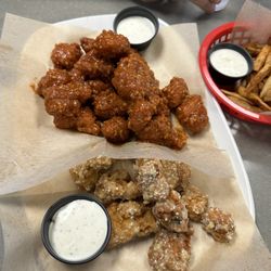 Wing It - Buffalo garlic wings on top, garlic Parmesan wings on bottom.