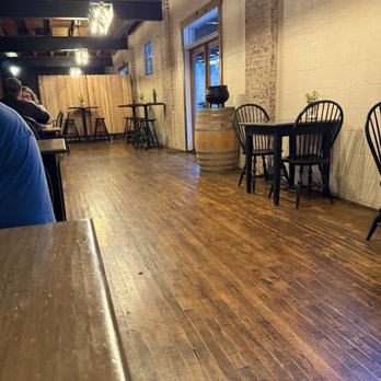 Alma Bea - One side of dining hall - see the huge space and tiny tables stick to the wall?  Why so small? - Barbeque Near Me - Shepherdstown, West Virginia