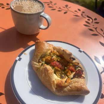 The Hidden Cafe - Feta and veggie on puff pastry w drip coffee and oat milk - Coffee & Tea Near Me - Berkeley, California The Hidden Cafe - Feta and veggie on puff pastry w drip coffee and oat milk - Coffee & Tea Near Me - Berkeley, California