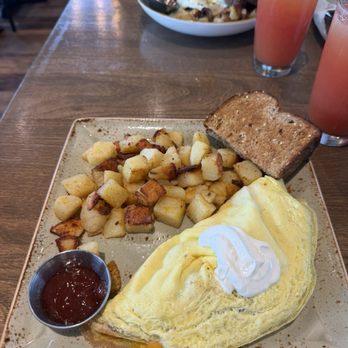 First Watch - The Works Omelet, with potatoes and toast. - Breakfast & Brunch Near Me - Jacksonville, Florida First Watch - The Works Omelet, with potatoes and toast. - Breakfast & Brunch Near Me - Jacksonville, Florida