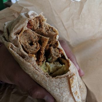 Evolution Fast Food - Began California burrito with about four baby bites. - Vegetarian Near Me - San Diego, California Evolution Fast Food - Began California burrito with about four baby bites. - Vegetarian Near Me - San Diego, California