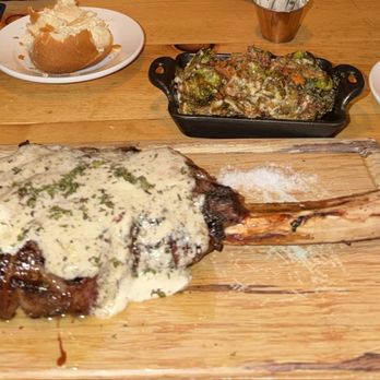 The Still Whiskey Steaks - 30 ounce ribeye with bone marrow garlic butter. Flash fried brussel sprouts - Steakhouses Near Me - Fort Collins, Colorado The Still Whiskey Steaks - 30 ounce ribeye with bone marrow garlic butter. Flash fried brussel sprouts - Steakhouses Near Me - Fort Collins, Colorado