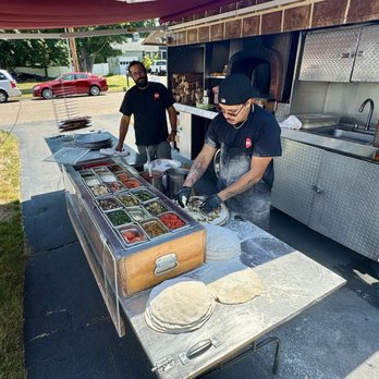 Old World Pizza Truck - Making pizzas - Caterers Near Me - New Haven, Connecticut Old World Pizza Truck - Making pizzas - Caterers Near Me - New Haven, Connecticut