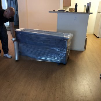 Team Up Movers - Plastic wrap on the Tv stand - Movers Near Me - Fremont, California Team Up Movers - Plastic wrap on the Tv stand - Movers Near Me - Fremont, California
