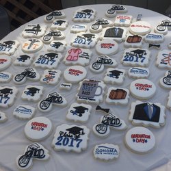 SSU graduation party with personalized cookies for a PT student, a Nursing Student, 2 Biology Students, and 2 Business Students.