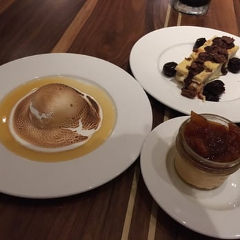 Spoke & Steele - Left: the bomb. Top: eclaire cake. Bottom: mandarin orange pot de creme. BIGGEST disappointment. - American Near Me - Indianapolis, Indiana Spoke & Steele - Left: the bomb. Top: eclaire cake. Bottom: mandarin orange pot de creme. BIGGEST disappointment. - American Near Me - Indianapolis, Indiana