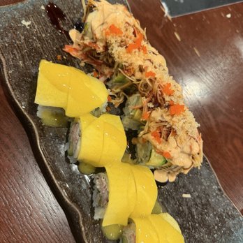 Momiji Sushi House - Bottom: Passion Roll Top: Volcano Roll - Sushi Bars Near Me - Spring Hill, Florida Momiji Sushi House - Bottom: Passion Roll Top: Volcano Roll - Sushi Bars Near Me - Spring Hill, Florida