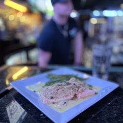 The Dublin Yard - Crab -Stuffed Salmon BROILED SALMON STUFFED WITH CRAB MEAT IN A LEMON CAPER SAUCE SERVED WITH A SIDE SAUTEED GREEN BEANS.