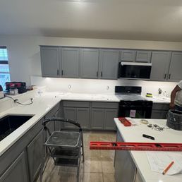 Kitchen, refinished doors and quartz countertops
