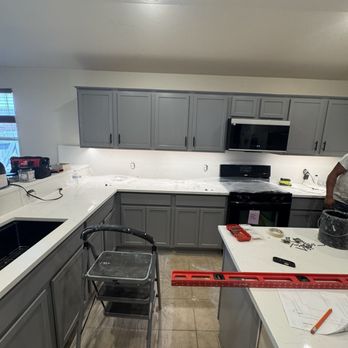 Palm Construction - Kitchen, refinished doors and quartz countertops - Decks & Railing Near Me - Austin, Texas