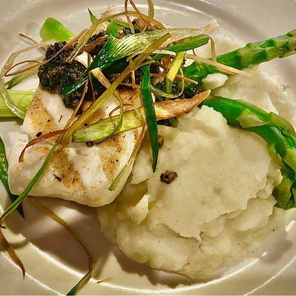 Halibut steak, fresh asparagus, and mashed potatoes. Halibut steak, fresh asparagus, and mashed potatoes.