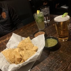 La Buena Vida - Chips and salsa with a Pacifico and mojito