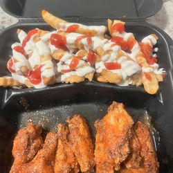 Yiannis Kitchen - 8 piece hot lemon pepper wings and fries.