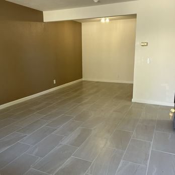 Juan Carlos construction - New tile throughout condo - General Contractors Near Me