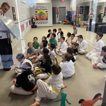 USSD French Valley - Sensei Carter teaching about the US and the US flag at the end of a class. - Karate Near Me - Winchester, California USSD French Valley - Sensei Carter teaching about the US and the US flag at the end of a class. - Karate Near Me - Winchester, California