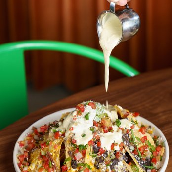 Blanco Cocina + Cantina - a plate of nachos - Tacos Near Me - Phoenix, Arizona Blanco Cocina + Cantina - a plate of nachos - Tacos Near Me - Phoenix, Arizona