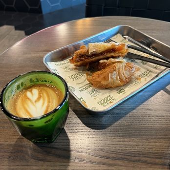 Dark Moon Coffee Roasters - Cortado with heated Chorizo croissant. - Coffee Roasteries Near Me - Henderson, Nevada