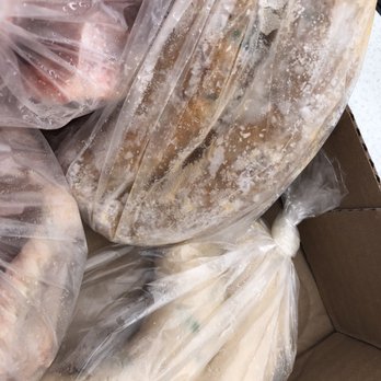 Aim Market - a cardboard box filled with bags of food - Butcher Near Me - San Leandro, California Aim Market - a cardboard box filled with bags of food - Butcher Near Me - San Leandro, California