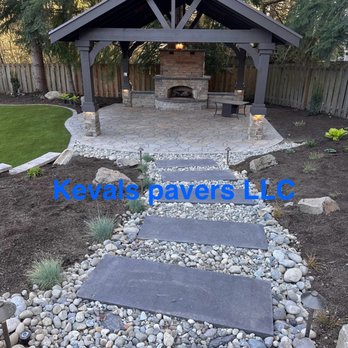 Kevals Pavers - In this project, we built a fireplace, constructed the pergola, built a patio, and added lights and steps. - Artificial Turf Near Me - Snoqualmie, Washington Kevals Pavers - In this project, we built a fireplace, constructed the pergola, built a patio, and added lights and steps. - Artificial Turf Near Me - Snoqualmie, Washington