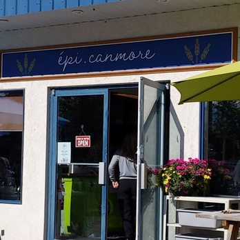 EPICanmore - a man entering a restaurant - Creperies Near Me - Canmore, Alberta