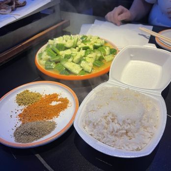 Xinjiang BBQ - Side of rice, garlic cucumber, and spices to dip skewer (cumin, mixed cumin, spicy) - Asian Fusion Near Me - San Diego, California Xinjiang BBQ - Side of rice, garlic cucumber, and spices to dip skewer (cumin, mixed cumin, spicy) - Asian Fusion Near Me - San Diego, California