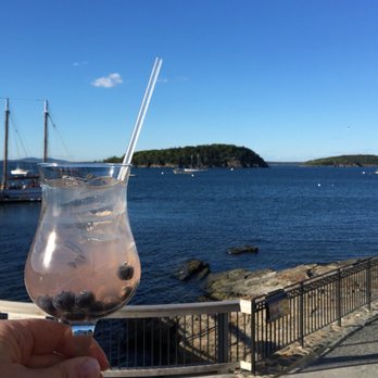 The Terrace Grille - Blueberry lemonade cocktail. And that view! - Seafood Near Me - Bar Harbor, Maine The Terrace Grille - Blueberry lemonade cocktail. And that view! - Seafood Near Me - Bar Harbor, Maine