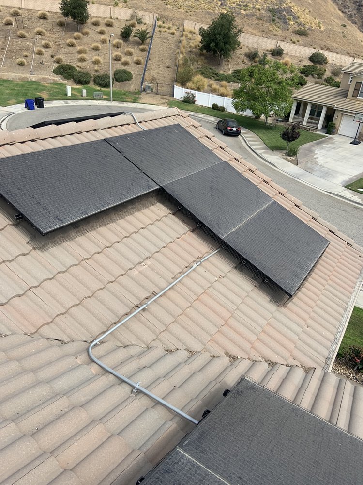 Slide of Roof Doctor Solar Panel Cleaning