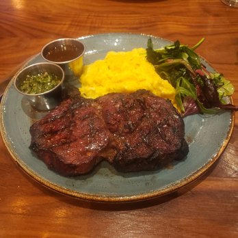 Casa Del Toro - Dry Aged rib eye and creamy polenta. Perfect combination. - Latin American Near Me - Hayward, California Casa Del Toro - Dry Aged rib eye and creamy polenta. Perfect combination. - Latin American Near Me - Hayward, California