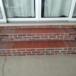 L & J Masonry - New wider stair entry for our new door using the old narrower stairway. The stairs have not been cleaned in this photo yet.