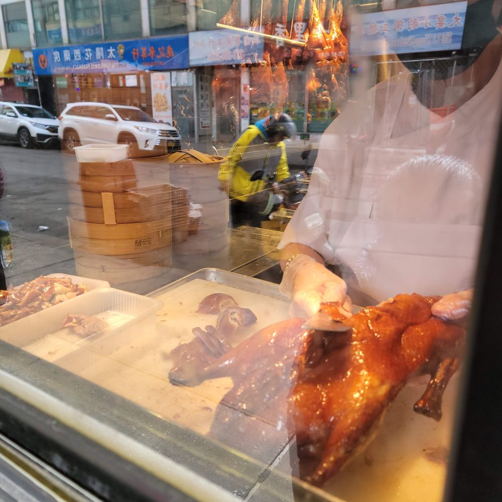 Peking Duck Sandwich Stall - Cutting duck - Food Stands Near Me - Flushing, New York Peking Duck Sandwich Stall - Cutting duck - Food Stands Near Me - Flushing, New York