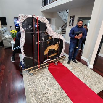STAR Movers - Moving a large Grand Piano.  Keeping all the floors protected - Movers Near Me - Hampton, Virginia