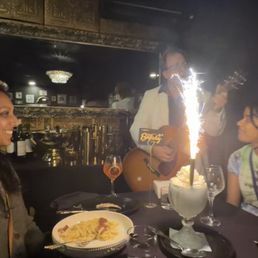 birthday celebration dessert sparkler with guitarist birthday celebration dessert sparkler with guitarist