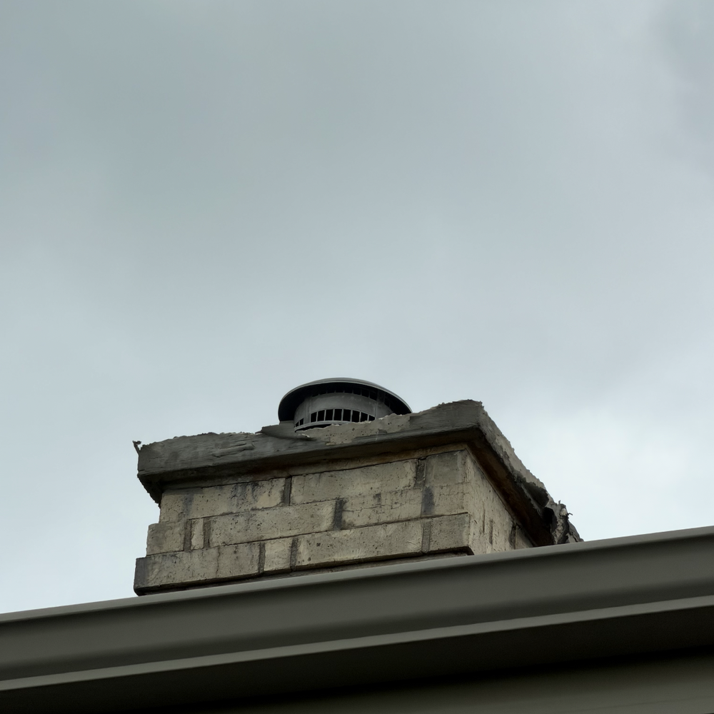 Chicago Chimney Service - Deteriorating concrete  on the chimney - Chimney Sweeps Near Me