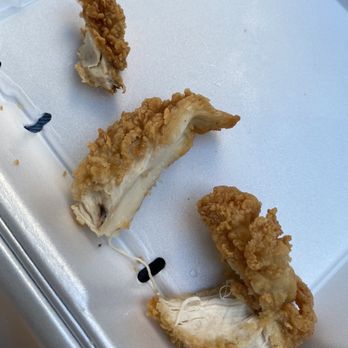Raising Cane's Chicken Fingers - a piece of fried chicken - Chicken Shop Near Me - Glendale, Arizona Raising Cane's Chicken Fingers - a piece of fried chicken - Chicken Shop Near Me - Glendale, Arizona