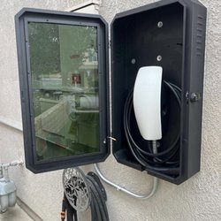 EV Pros - Wall connector in the security box that has a lock code and temperature gauge.