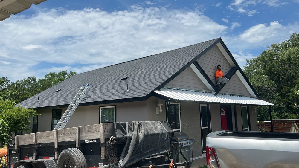 Slide of DE AL Roofing