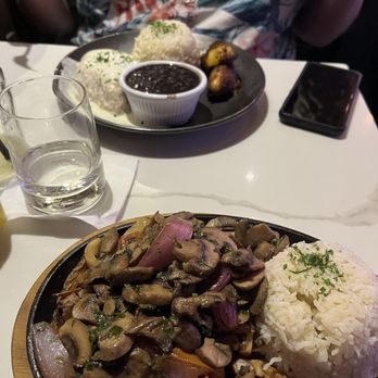Mojo - My husband got the Chicken Mojo I got the Hongos Saltado a delicious veggie stir fry over truffle fries - Latin American Near Me - Forest Hills, New York Mojo - My husband got the Chicken Mojo I got the Hongos Saltado a delicious veggie stir fry over truffle fries - Latin American Near Me - Forest Hills, New York