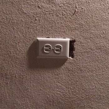 DdA Home Remodel - One of two badly patched new outlets, that was not fixed by DdA until a second request. - General Contractors Near Me - Milton, Massachusetts