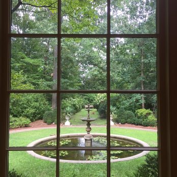 Dixon Gallery & Gardens - There was a fox standing in front of the bench in the distance when we were in the garden.  We followed him for a good bit. - Museums Near Me - Memphis, Tennessee