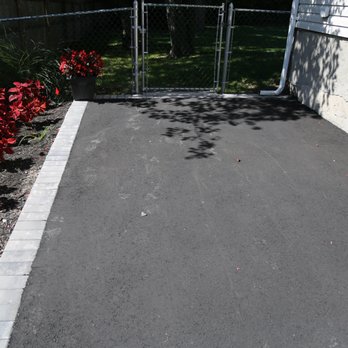 Opal Construction - Permanent foot and drag marks left by Opal on my driveway - General Contractors Near Me - Bay Shore, New York