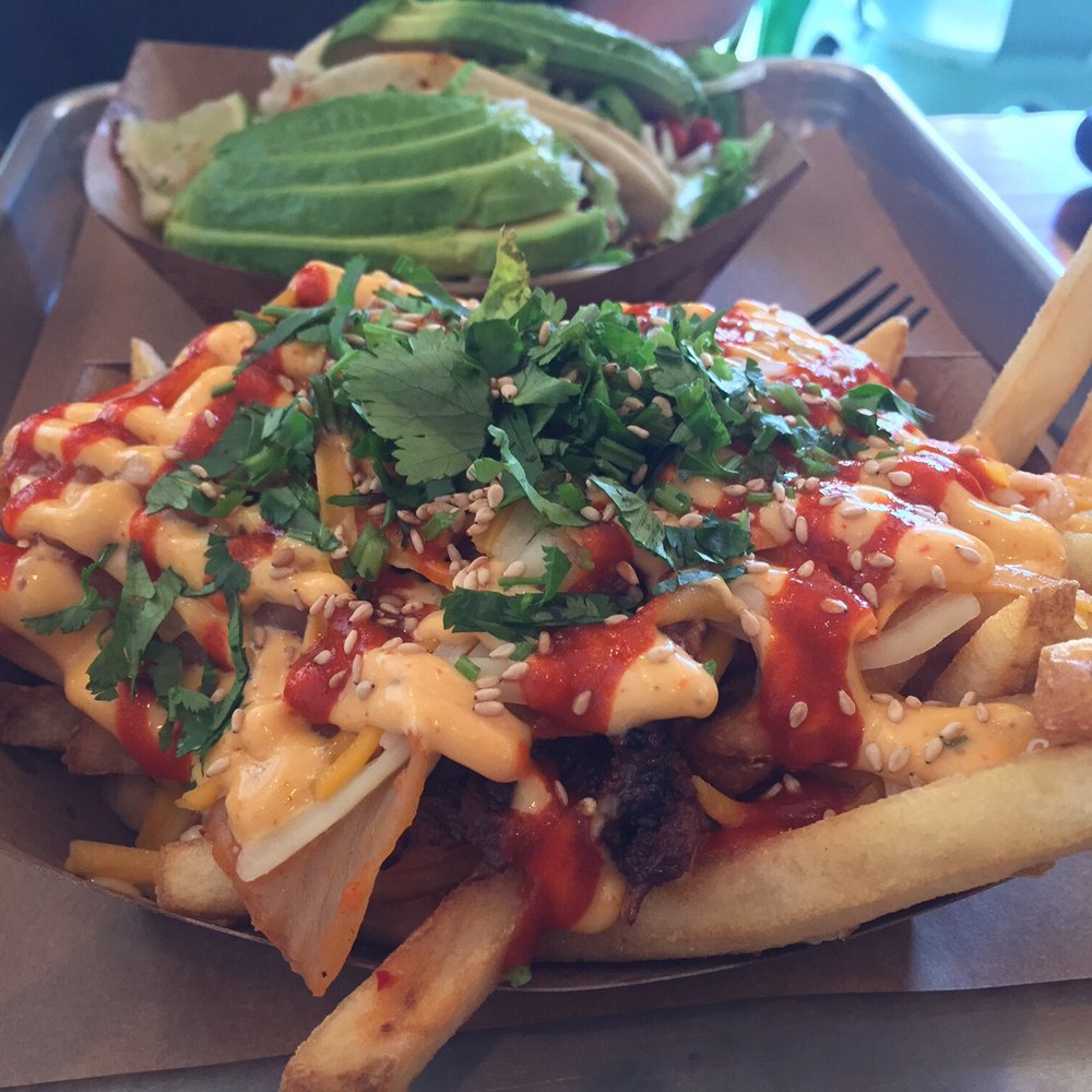 Chi'Lantro - Spicy pork kimchi fries - Korean Near Me - Austin, Texas Chi'Lantro - Spicy pork kimchi fries - Korean Near Me - Austin, Texas