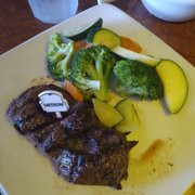 Photo of Sizzler - San Diego, CA, United States. 6 oz steak, medium with steamed veggies