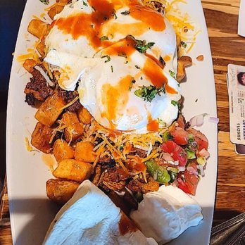 Toast 101 - The Hangover (chorizo hash skillet with over easy eggs) - Breakfast & Brunch Near Me - Tucson, Arizona Toast 101 - The Hangover (chorizo hash skillet with over easy eggs) - Breakfast & Brunch Near Me - Tucson, Arizona