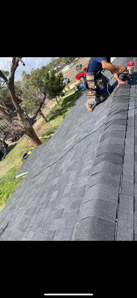 Slide of Lira Roofing