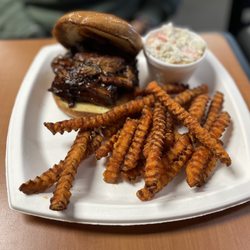 Dean's Den - BBQ sandwich with sweet potato crinkle fries and coleslaw.