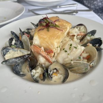 Dune 18 - Halibut over risotto in a cream sauce with lobster, scallops, shrimp, clams and mussels. - Seafood Near Me - Ship Bottom, New Jersey Dune 18 - Halibut over risotto in a cream sauce with lobster, scallops, shrimp, clams and mussels. - Seafood Near Me - Ship Bottom, New Jersey