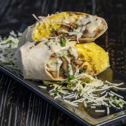 Fin & Feathers - BREAKFAST BURRITO flour tortilla with three eggs, green and red peppers, mushrooms, spinach, tomatoes & cheese with bacon or chicken sausage