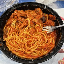 Antonio's Trattoria - The spaghetti & sausage dinner I got for $19. The spaghetti doesn't even cover the bottom of the container.