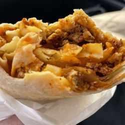 Family Basket - Mmm. Inside view of their chorizo breakfast burrito (Still $9.49)